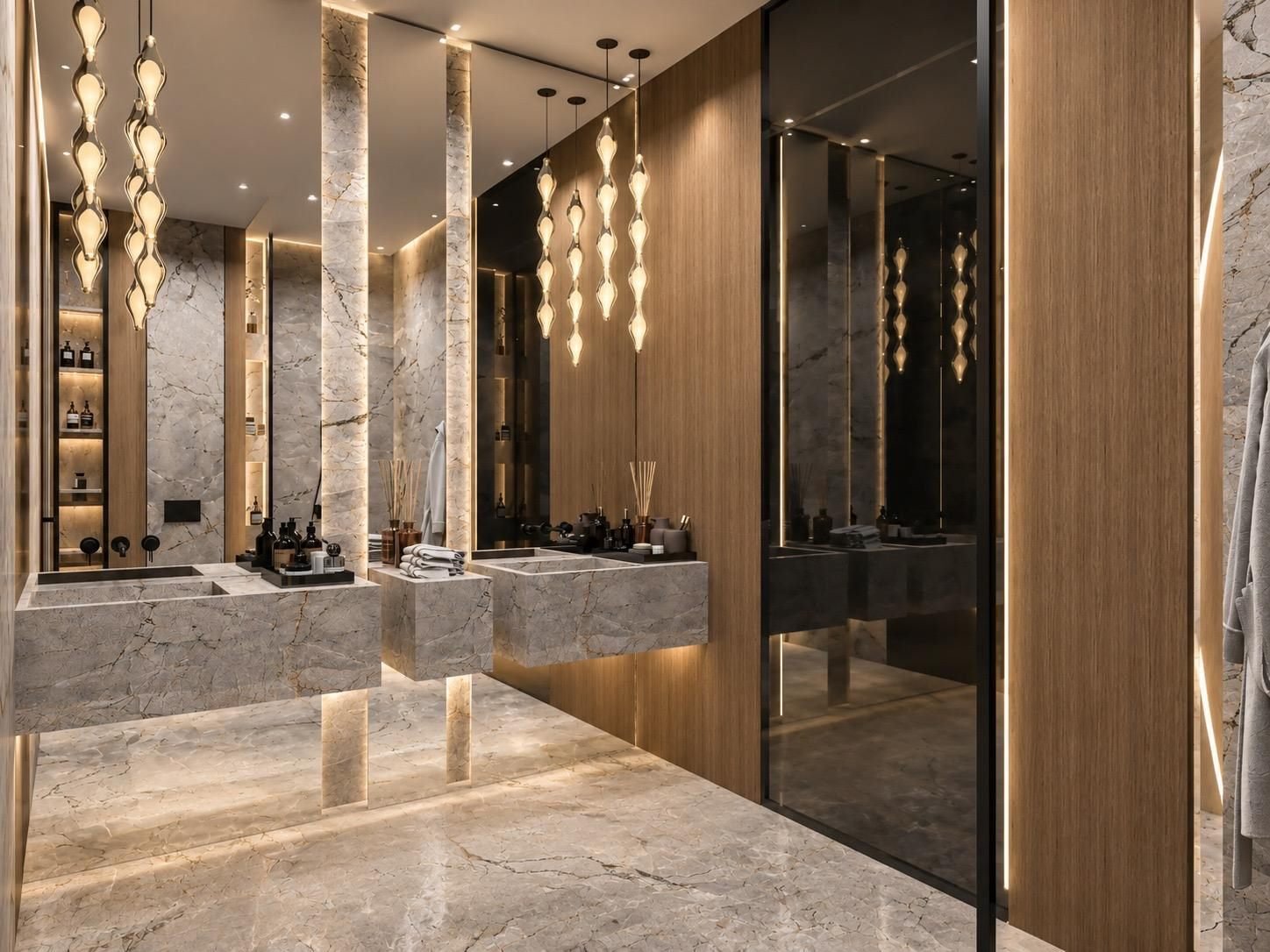 Salle de bain en marbre, vasques massives et suspensions en verre